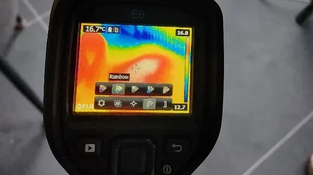 Thermal imaging camera used during underfloor heating leak detection